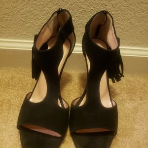 Black suade tassel heels